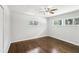Comfortable bedroom featuring wood floors, natural light, and a calming atmosphere for relaxation at 1281 Snapfinger Rd, Decatur, GA 30032