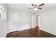 Bright bedroom with wood floors and ceiling fan; a comfortable and inviting space for rest at 1281 Snapfinger Rd, Decatur, GA 30032