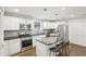 Well-equipped kitchen with stainless steel appliances, granite countertops, and gray tile backsplash at 1281 Snapfinger Rd, Decatur, GA 30032
