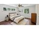 Inviting main bedroom featuring hardwood floors and windows with natural light at 1281 Snapfinger Rd, Decatur, GA 30032