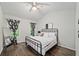 Comfortable bedroom featuring a ceiling fan, a full-sized bed, and bright windows at 2450 Norwood Park Xing, Atlanta, GA 30340