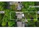 Aerial view of the property at 26 Clarendon, showcasing its lush surroundings and desirable neighborhood location at 26 Clarendon Ave, Avondale Estates, GA 30002