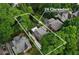 Aerial view of 26 Clarendon showcasing the property's layout and surrounding landscape at 26 Clarendon Ave, Avondale Estates, GA 30002