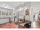 Bright kitchen with stainless appliances, breakfast bar, and wine rack storage space at 26 Clarendon Ave, Avondale Estates, GA 30002