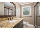 Bathroom featuring a granite countertop, single sink vanity, and a glass enclosed shower at 351 Old Orchard Ct, Marietta, GA 30068
