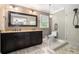 Elegant bathroom featuring double vanity, granite countertop, and glass-enclosed shower with modern fixtures at 351 Old Orchard Ct, Marietta, GA 30068