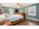 Spacious bedroom with hardwood floors, ceiling fan, natural light, and neutral decor at 351 Old Orchard Ct, Marietta, GA 30068