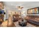 Spacious living room with stone fireplace, hardwood floors, and open access to the kitchen at 351 Old Orchard Ct, Marietta, GA 30068