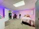This is a finished basement bedroom with plush carpet flooring and plenty of room to play at 505 Blake Dr, Douglasville, GA 30134