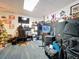 Large finished room with carpet flooring, entertainment area, and unique Tennessee Vols decor at 505 Blake Dr, Douglasville, GA 30134