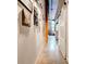 Hallway with gallery wall and sliding barn door, showcasing the home's unique character at 170 Boulevard # H201, Atlanta, GA 30312