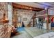 Spacious living room featuring exposed brick, industrial details, and an open layout with a loft at 170 Boulevard # H201, Atlanta, GA 30312