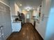 Galley kitchen featuring white cabinets, stainless steel appliances, and granite countertops at 1740 Emerald Ave Ave, Atlanta, GA 30310