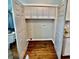 Spacious laundry room featuring ample storage space with open doors, ready for appliances at 1740 Emerald Ave Ave, Atlanta, GA 30310