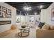 Spacious finished basement with an electric fireplace, comfortable seating, and modern lighting at 3226 Custer Lake Nw Dr, Marietta, GA 30064