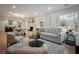 Cozy living room with fireplace, hardwood floors, and plenty of natural light at 3226 Custer Lake Nw Dr, Marietta, GA 30064