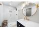 Contemporary bathroom with a glass-enclosed shower, vanity with quartz countertop, and stylish fixtures at 3445 Strawberry Ln, Cumming, GA 30041
