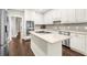 Stylish kitchen featuring stainless steel appliances, a large island, and ample counter space at 3445 Strawberry Ln, Cumming, GA 30041