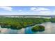 Expansive aerial view showcasing the beautiful lakefront property at 3445 Strawberry Ln, Cumming, GA 30041