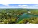 Panoramic aerial view of a picturesque lake community at 3445 Strawberry Ln, Cumming, GA 30041