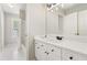 Bathroom featuring a shower-tub combo, sleek vanity, and a modern mirror at 1552 Brentwood Dr, Marietta, GA 30062
