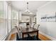 Cozy dining room featuring hardwood floors, natural light, and stylish lighting at 1552 Brentwood Dr, Marietta, GA 30062