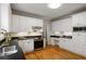 Spacious kitchen featuring stainless steel appliances, sleek countertops, and ample cabinetry at 1552 Brentwood Dr, Marietta, GA 30062