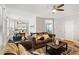 Open concept living room flowing into the dining area, featuring hardwood floors at 1552 Brentwood Dr, Marietta, GA 30062