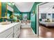 This ensuite bathroom features double vanities and a soaking tub next to the primary bedroom at 2069 Brightleaf Way # 123, Marietta, GA 30060