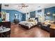 This main bedroom features stylish decor, a ceiling fan, and lots of natural light at 2069 Brightleaf Way # 123, Marietta, GA 30060