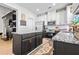 Modern kitchen featuring dark island, granite countertops, and stainless steel appliances at 2069 Brightleaf Way # 123, Marietta, GA 30060