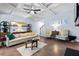 Bright living room featuring a coffered ceiling, hardwood floors, and neutral paint at 2069 Brightleaf Way # 123, Marietta, GA 30060