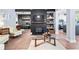 Relax in the cozy living room with a fireplace and built-in shelving, perfect for entertaining guests at 2069 Brightleaf Way # 123, Marietta, GA 30060