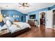 Spacious primary bedroom with hardwood floors, ensuite bathroom, and walk-in closet at 2069 Brightleaf Way # 123, Marietta, GA 30060