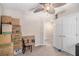 Bedroom featuring a ceiling fan, a closet, and moving boxes at 300 Alcovy Way, Covington, GA 30014