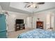 View of a bedroom with light-colored walls, carpet flooring, and a ceiling fan at 300 Alcovy Way, Covington, GA 30014