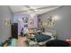 Bedroom featuring 2 twin beds, movie posters, and a ceiling fan at 300 Alcovy Way, Covington, GA 30014