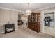 Elegant dining room featuring a stylish chandelier and seamless transition to the living room and kitchen at 300 Alcovy Way, Covington, GA 30014