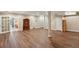 Spacious basement area with new flooring and access to the backyard through French doors at 4584 E Conway Nw Dr, Atlanta, GA 30327