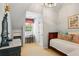 Cozy bedroom with a built-in desk, daybed, and charming decor at 4584 E Conway Nw Dr, Atlanta, GA 30327