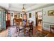 Formal dining room with hardwood floors, oriental rug, a round table, and large built-in cabinets at 4584 E Conway Nw Dr, Atlanta, GA 30327