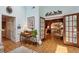 Cozy sitting room features hardwood floors, French doors, and decorative accents at 4584 E Conway Nw Dr, Atlanta, GA 30327