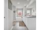 Bathroom featuring tile floors, double sinks, separate shower, and tub at 509 Azalea Bloom Dr, Loganville, GA 30052