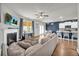 An open floor plan shows the living room next to the kitchen and dining area at 509 Azalea Bloom Dr, Loganville, GA 30052