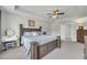 Inviting main bedroom featuring a spacious layout, ceiling fan, and ensuite bathroom at 509 Azalea Bloom Dr, Loganville, GA 30052