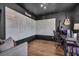 Modern office space with sleek black walls, whiteboards, and trendy decor, perfect for creativity at 509 Azalea Bloom Dr, Loganville, GA 30052