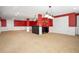Finished basement bar area equipped with sleek countertops, a mini fridge, and custom shelving at 6020 Ettington Dr, Suwanee, GA 30024