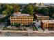 Aerial shot of the property showcasing the rooftop deck, parking and surrounding landscape at 677 Somerset Ne Ter # C6, Atlanta, GA 30306