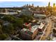Sweeping aerial view of the property showcasing cityscape views with rooftop terrace at 677 Somerset Ne Ter # C6, Atlanta, GA 30306
