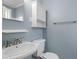 Well-lit bathroom with updated vanity, fixtures, mirror and ample storage at 677 Somerset Ne Ter # C6, Atlanta, GA 30306